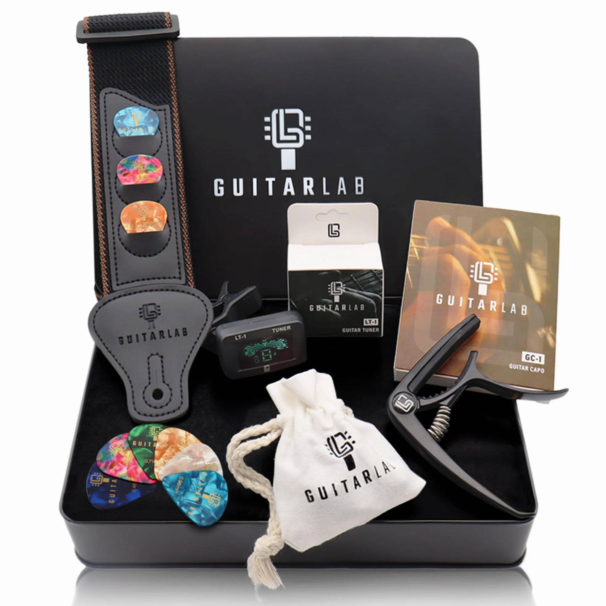 Guitar Lab Kit di accessori per chitarra – Scatola in metallo di alta qualità con cinghia per chitarra, capotasto e sintonizzatore per chitarra elettronica a clip, plettri acustici, bassi